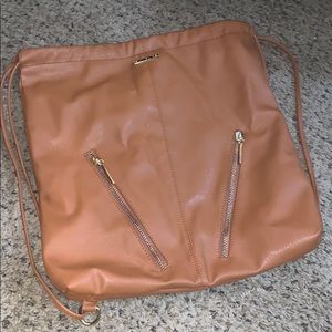 Camel Leather purse backpack.